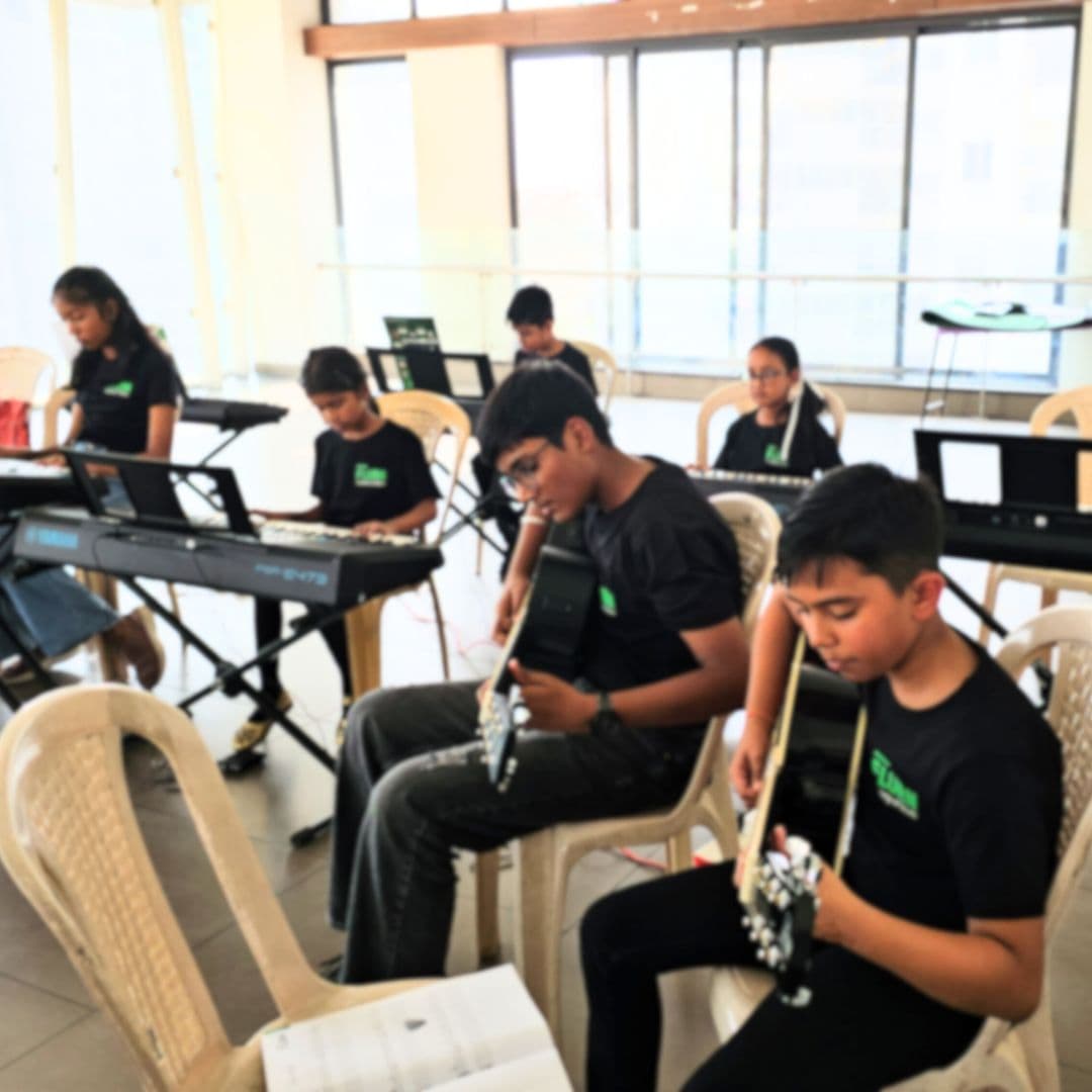 Apartment residents and children discussing activities in a clubhouse